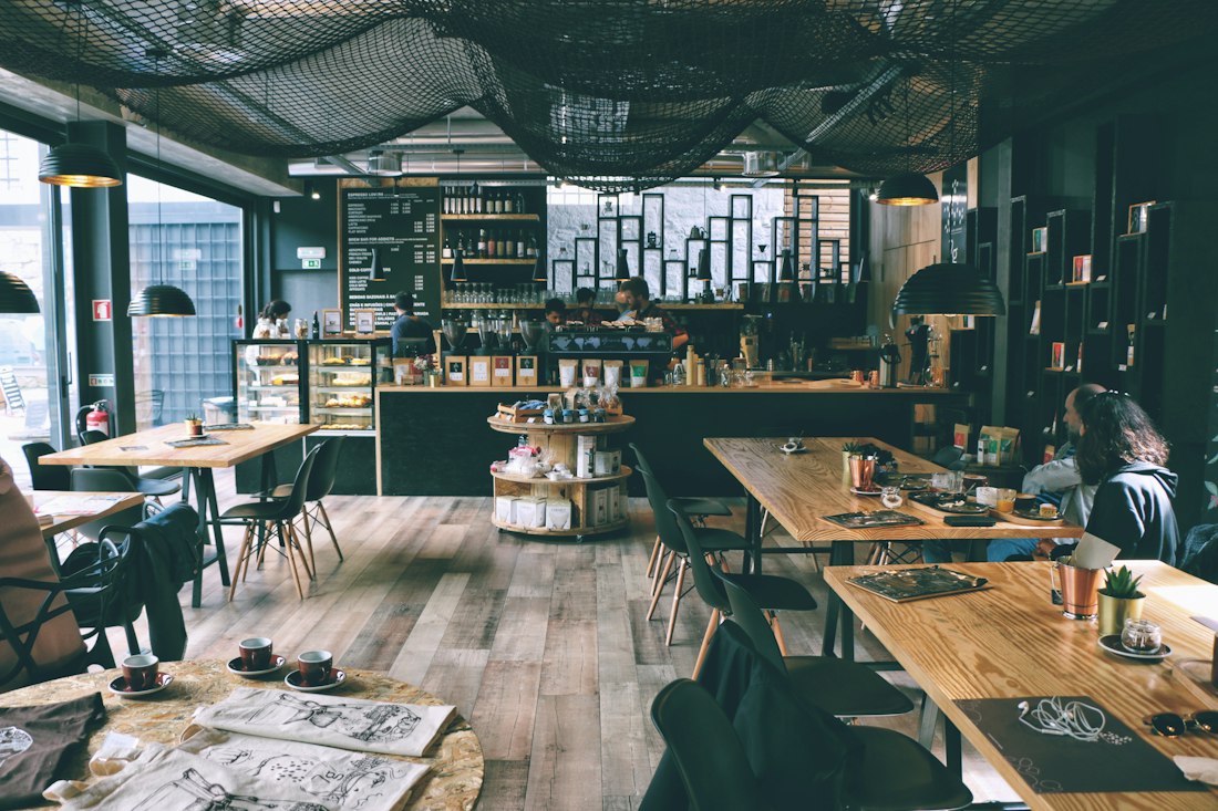 Warm, wood-panelled café interior with soft lighting
